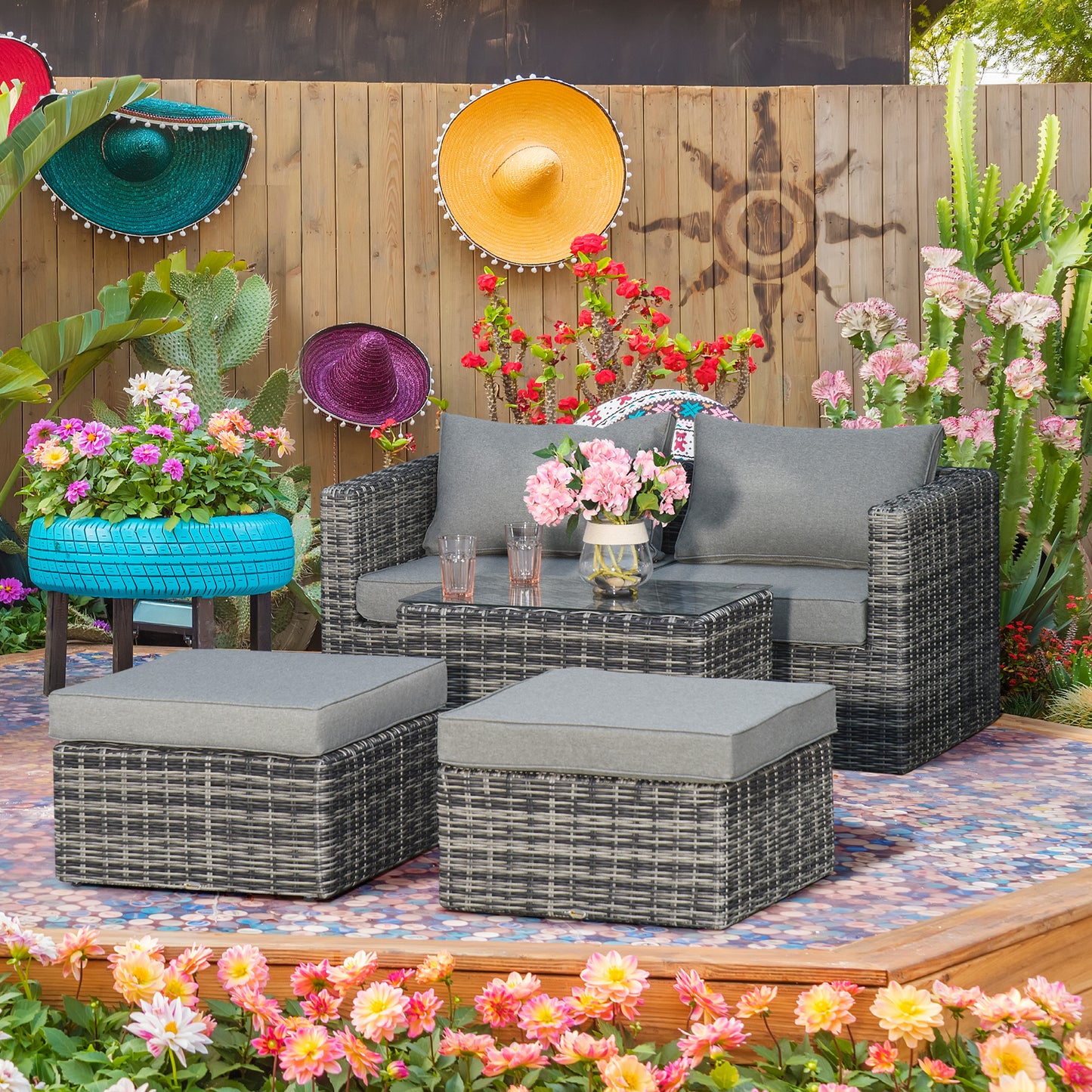 Five Piece Rattan Armchair, Stool and Table Set